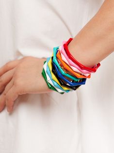 Your finishing touch calls for a burst of color and texture. Featuring a funky bamboo shape and easy stretch. -Length 8" -0.144 Weight Trendy Red Plastic Bracelets, Trendy Red Plastic Bracelet, Trendy Multicolor Stretch Bracelets, Trendy Stretch Multicolor Bracelets, Trendy Colorful Plastic Bracelets, Multicolor Stretch Bracelets Casual Style, Trendy Flexible Multicolor Bracelets, Trendy Red Stretch Bracelet For The Beach, Trendy Colorful Plastic Bracelet