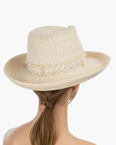 Tucson is a designer woman's sunhat for sale made of Squishee®. The modified Western shape has a fringe-edged band and a self-bolo braid chin strap with a wood bead to adjust and secure it. The signature logo rivet is discretely placed at the back of the crown. The wired brim permits shaping; push up the sides for more Western flare, or flatten them out for additional shade. Squishee® is a man-made material incorporating recycled fibers. It looks and feels just like natural raffia but has the ad A Wood, Signature Logo, Straw Hat, Tucson, Wood Beads, Sun Hats, Floppy Hat, Straw, Crown