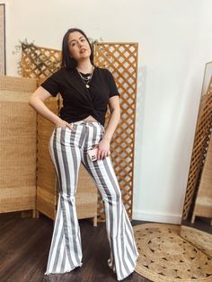 STRIPED DENIM FLARES. 98% COTTON, 2% SPANDEX. Cream/Charcoal Stripes. Trendy Striped Bottoms For Spring, Striped Flare Bottoms For Spring, Casual Striped Flare Bottoms, Spring Flare Striped Bottoms, Spring Striped Flare Bottoms, Casual Flared Striped Bottoms, Trendy Striped Flare Bottoms, Trendy Striped Flare Pants, High Rise Striped Pants For Spring