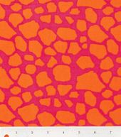 an orange and pink pattern with dots on it