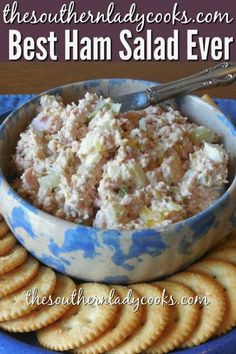 the best ham salad ever with crackers in a blue and white bowl next to it