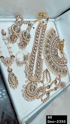 This is indian Pakistani Wedding Full Bridal Jewelery / Wear It on wedding , Nikah , Made with real Polki kundan Stones with pearls .  Included : Choker With Long Necklace  Earrings , Mathapatti ( Hair accessories ) . Hand Accessories . Nosepin . Shining Kundan Necklace With Earings And Tikka. For Wedding , Nikah , Sangeet , Baraat , For Bride. Thank You :) Mathapatti Brides, Traditional White Jewelry For Marriage, Wedding Accessories With Stone Work, Wedding Bridal Sets In Temple Jewelry Style, Kundan Bridal Sets For Marriage, Wedding Jewelry With Cutdana, Round Meenakari Bridal Sets For Wedding, Bridal Sets With Stone Work For Marriage, Round Bridal Sets With Stone Work For Marriage