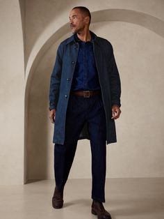 Beloved denim--that most versatile and compelling of cotton fabrics--used here to craft a traditional mac coat, tailored to last from season to season with a sumptuously soft Italian denim and cut below the knee to keep the chilliest temperatures at Blue Unstructured Outerwear For Fall, Long Cotton Coat With Hidden Button Closure, Cotton Long Coat With Hidden Buttons, Dark Wash Single Breasted Cotton Outerwear, Dark Wash Single-breasted Cotton Outerwear, Single-breasted Dark Wash Cotton Outerwear, Unstructured Denim Outerwear For Fall, Indigo Relaxed Fit Outerwear For Fall, Relaxed Fit Indigo Outerwear For Fall