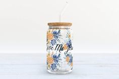 a mason jar with a straw in it that says give me joy on the inside