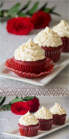 red velvet cupcakes with white frosting and roses in the background on a plate