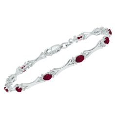 This captivating ruby and genuine diamond tennis bracelet is perfect for anyone who wants to add a pop of color to their jewelry collection. Masterfully crafted in .925 sterling silver, this brilliant piece features 10 sparkling ruby center stones which are accompanied by 60 round diamonds weighing 3/8 CTW. The stylish X-shaped chain design and regal dark red stones elevate this bracelet from your typical accessory. If you are looking for a timeless bracelet that will be treasured and cherished Red Diamond Bracelet With Gemstone, Classic Ruby Gemstone Tennis Bracelet, Ruby Gemstone Tennis Bracelet In Fine Jewelry Style, Red Diamond Tennis Bracelet, Ruby Gemstone Tennis Bracelet For Anniversary, Oval Ruby Diamond Bracelet, Fine Jewelry Ruby Diamond Bracelet With Accents, Fine Jewelry Ruby Bracelet With Diamond Accents, Ruby Diamond Bracelet For Anniversary