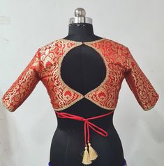 Blouse will be made to order to your measurements. I'll send you the measurements sheet once you order. You can mention a standard size if you prefer that. Please send me a message for customisation requests. Blouse For Benarasi Saree, Red Blouse For Lehenga, Banarasi Blouse Designs Latest Back, Silk Brocade Blouse Designs, Silk Blouse Designs Back, Bnarsi Sadi Blouse Design, Blouse Designs Latest Banarasi Saree, Banarasi Sari Blouse Designs, Silk Blouse Back Designs