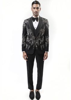 Our stellar metal hand-embellished tuxedo is accentuated with metallic embroidery. Double buttoned satin details on peak collar. This opulent can be worn with overlapped waist jacket for the perfect cocktail ensemble. Rahul Khanna, Metallic Embroidery, Waist Jacket, Perfect Cocktails, Metal Hand, Interstellar, Satin, Embroidery, Collar