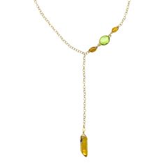 Expertly crafted with 14k gold filled material and gold quartz stones, this asymmetrical necklace exudes luxury. The unique design features an elephant charm on the back, adding a touch of whimsy. Perfect for everyday wear or special occasions, this necklace is a must-have for any fashion-forward individual. Adjustable Yellow Gold Necklace With Gemstone Beads, Gold Gemstone Crystal Dangle Necklaces, Gold Dangle Gemstone Crystal Necklaces, Gold Crystal Dangle Necklaces With Gemstone, Gold Lariat Necklaces With Gemstone Beads, Gold Dangle Crystal Necklaces With Gemstone, Fine Jewelry Citrine Necklaces With Gemstone, Fine Jewelry Citrine Gemstone Necklaces, Adjustable Gold Lariat Crystal Necklaces