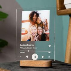 an acrylic photo frame with two women on it