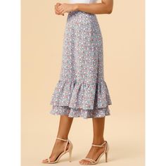 Featuring it's pretty ditsy floral print, this midi skirt is a summery option that can be worn with just about anything. Channel elegant style in this midi skirt, beautifully printed with a blossom print for a versatile look. It is made from lightweight fabric, adds definition to the free-flowing design. Falling to a waterfall midi hem, it sits high on the waist with a discreet side zip fastening. Summer days call for effortlessly feminine styles like the skirt. Summer Ruffle Hem Midi Skirt, Flowy Summer Midi-length Bottoms, Feminine Midi Length Bottoms With Ruffles, Summer Tiered Maxi Skirt For Brunch, Summer Brunch Maxi Tiered Skirt, Summer Brunch Tiered Maxi Skirt, Spring Midi Bottoms With Ruffle Hem, Flowy Ruffled Midi Length Skirt, Non-stretch Summer Midi Skirt