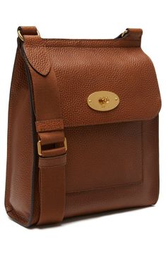 Inspired by traditional postman's bags, this version of the Antony satchel is updated with a slightly larger base for increased capacity. It's crafted from richly grained, vegetable-tanned calfskin that develops character over time, and sports an adjustable canvas strap for shoulder or crossbody carrying. Style Name:Mulberry Antony Leather Crossbody Bag. Style Number: 6156701. Designer Saddle Bag For Everyday Use With Turn-lock Closure, Classic Satchel Saddle Bag With Smooth Grain, Classic Saddle Bag Satchel With Smooth Grain, Classic Brown Flap Bag With Textured Leather, Classic Smooth Grain Crossbody Satchel, Classic Business Flap Bag In Textured Leather, Classic Textured Leather Flap Bag For Business, Classic Brown Textured Leather Flap Bag, Classic Business Flap Bag With Textured Leather