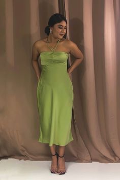 Midi dress Halter neck tie fastening Zipper fastening on the side 97% polyester 3% spandex Model is wearing a size small Color- green Green Knee-length Dress For Brunch, Light Green Fitted Dress For Brunch, Fitted Green Dress For Brunch, Fitted Green Dresses For Brunch, Light Green Summer Dress For Brunch, Light Green Midi Dress For Spring, Green Fitted Maxi Dress For Brunch, Chic Fitted Light Green Midi Dress, Light Green Spring Dress For Brunch