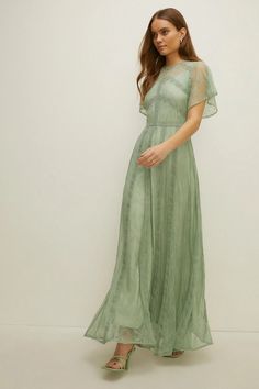 Short Bridesmaid Dresses With Sleeves, Subtle Floral Bridesmaid Dresses, Garden Party Bridesmaid Dress Green, Sage Green Dress Formal Modest, Sage Green Boho Bridesmaid Dresses, Green Sage Dresses, Green Boho Bridesmaid Dress, Mint Maxi Dress, Sage Green Lace Bridesmaid Dresses