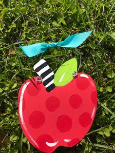 Red apple ornament. Hand crafted. Attached bow.  Measures 5in tall by 5in wide.  Choose your personalization and wording if desired. Mention in notes the date and name. Apple Door Hanger, Apple Crafts, Wood Apple, Apple Wreath, Apple Teacher, Wood Apples, Apple Craft, Pumpkin Door Hanger, Lilly Inspired