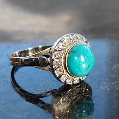 When ordering, please give us your phone number for safer Fedex shipping!Ring Size: US 6 3/4 EU 54 (FREE RESIZING) Metals Type: Hallmarked 18K White Gold Weight: 4.50 grams Total diamond weight 0.32 ct. Cut: single cut Color/Clarity: H/Si Natural turquoise Condition: Excellent This 1920s Art Deco Vintage Antique Diamond and Turquoise Solid 18k Hallmarked White Gold Engagement Multi Stone Ring is a stunning piece of jewelry that is sure to turn heads. The ring features a beautiful combination of diamonds and turquoise stones, set in a solid 18k white gold band that is hallmarked for authenticity. The intricate design and impeccable craftsmanship reflect the opulence of the Art Deco era, making this ring not just jewelry but a piece of history. Its timeless allure is accentuated by the mesme Elegant Turquoise Ring Collectible, Antique Turquoise Anniversary Ring, Classic Turquoise Cabochon Ring For Anniversary, Heirloom Turquoise Gemstone Ring For Anniversary, Fine Jewelry Turquoise Cabochon Ring For Anniversary, Elegant Hallmarked Turquoise Ring For Anniversary, Elegant Turquoise Ring With Bezel Setting For Anniversary, Heirloom Turquoise Ring For Anniversary, Classic Hallmarked Turquoise Ring For Anniversary