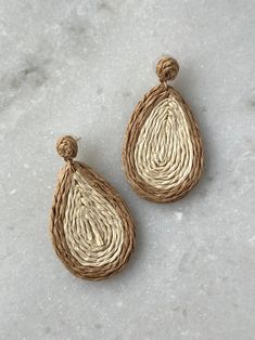 Elevate your summer style with our Straw Tear Dangle Earrings! These unique earrings feature a chic straw color block detail, adding a touch of natural elegance to any outfit. The tan base with a light grey outline adds a subtle pop of contrast, making these earrings the perfect statement piece. Natural Color Drop Earrings For Summer, Bohemian Beige Earrings For Spring, Brown Earrings For Summer Vacation, Bohemian Brown Earrings For Spring, Elegant Beige Earrings For Summer, Chic Beige Beach Jewelry, Brown Drop Earrings For Beach, Brown Drop Earrings For The Beach, Natural Drop Earrings For Vacation