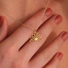 This 14K Solid Gold Lotus Necklace would be the perfect Christmas gift for your daughter, wife, or mother. Lotus Flower Symbol Jewellery represents the symbolism of enlightenment, beauty and new beginnings. It is highly sacred in many cultures throughout the world including Hinduism, Buddhism and Ancient Egypt This minimalist personalized piece is a perfect Christmas gift to share your love and be memorable for years. Minimalist, custom, dainty, special to you... ♡ LOTUS NECKLACE ✣ * Made to Ord Gold Flower Pendant Jewelry For Wedding, Simple Gold Jewelry For Wedding, Gold Wedding Jewelry Gift, Simple Rose Gold Necklace For Wedding, Yellow Gold Delicate Chain Jewelry For Wedding, Adjustable Round Bridal Necklace Gift, Dainty Flower Pendant Jewelry For Wedding, Gold Necklaces For Wedding And Mother's Day, Minimalist Jewelry For Wedding Gifts