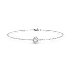 The Forevermark Tribute™ Collection celebrates the unique and brilliant women who wear it. This bracelet may be worn stacked or layered to reflect your individual style and character. Learn how to wear your favorite pieces in multiple ways, by layering for any mood or occasion with our jewelry stacking guide.