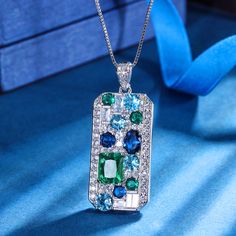 ✰ This stunning retro multicolor-stone jewelry set is a perfect blend of timeless elegance and vibrant color. Featuring a dazzling emerald cz pendant necklace,an exquisite sapphire adjustable ring, and striking aquamarine dangle earrings, this set is ideal for making a statement at any event.  ✰ Each piece in this collection is intricately designed to capture the timeless allure of vintage fashion while adding a modern twist with its vibrant gemstones and sparkling accents. Perfect for weddings, engagements, or as a bridesmaid gift, symbolizing love, commitment, and elegance. ✰ This set is made from copper and plated with white gold, ensuring both durability and a luxurious shine. The adjustable design allows for a perfect fit, making it a versatile and chic accessory for any occasion. ✰ C Emerald Pendant Necklace, Necklace Sapphire, Neck Accessories, Aquamarine Earrings, Color Jewelry, Writing Gifts, Emerald Pendant, Square Pendant, Geometric Pendant