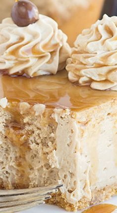 a piece of cake with caramel icing and nuts on top