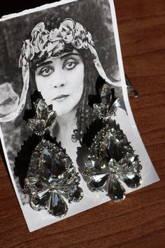 Art deco style rhinestone wedding chandalier earrings Art Deco Drop Earrings For Evening, Silver Rhinestone Earrings For Glamorous Events, Silver Earrings With Rhinestones For Glamorous Events, Elegant Crystal Bridal Earrings For Glamorous Events, Glamorous Diamond Bridal Earrings With Crystals, Elegant Silver Bridal Earrings, Crystal Dangle Jewelry For Glamorous Events, Art Deco Silver Dangle Bridal Earrings, Silver Art Deco Dangle Bridal Earrings