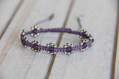 Amethyst Beaded Lavender Macrame Sterling Silver Flower Bracelet Spiritual Center, Beaded Flower Bracelet, Pisces And Capricorn, Amethyst Flower, Higher Consciousness, Chakra Bracelet, Amethyst Beads, Crown Chakra, Bracelet Crafts