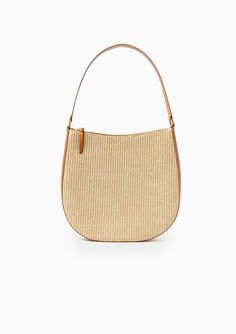 Loeffler Randall's Bowen Straw Hobo bag is a straw-inspired woven fabric shoulder bag with cognac vachetta leather trim. Featuring a leather handle, zipper closure, cotton lining, and interior zippered pocket and slip pocket. 52% Cotton, 48% Polyamide | Trim: 100% Bovine Leather Dimensions: 13" x 3.5" x 12" 10.5" Strap Drop Summer Clutch, Loeffler Randall, Leather Trim, Hobo Bag, Leather Handle, Chain Strap, Leather Trims, Cognac, Woven Fabric