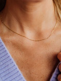 This classic gold chain is a modern basic for every woman. We are in love with this delicate mini 'paperclip' chain that can be worn on its own, layered with other necklaces, or holding your favorite charms and pendants. Our 14k gold chain has delicate, rectangular “paperclip” links which give this chain a cool, modern look! Available in 16”, 18", 20", and 24" - there is a perfect length for just about anyone! Dainty Gold Chain, Dainty Gold Jewelry, Initial Jewelry, Classic Gold, Gold Chain Necklace, Paper Clip, Every Woman, Gold Chain, Gold Chains