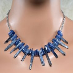 LP 1356 Kyanite Slices And Kyanite Spikes by laurapaulinejewelry Blue Kyanite Gemstone Necklace, Handmade Sapphire Kyanite Necklace, Handmade Sapphire Necklace In Kyanite, Blue Kyanite Gemstone Beads Jewelry, Blue Kyanite Jewelry With Gemstone Beads, Modern Blue Gemstone Necklace, Blue Oval Faceted Necklaces, Blue Oval Faceted Necklace, Modern Blue Oval Necklace