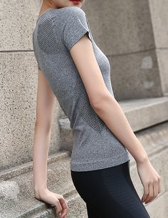 Stretchy, soft sport workout top. Large fits as a medium 92% Nylon, 8% Spandex High Stretch Athleisure T-shirt For Workout, Sporty Athletic Fit T-shirt For Light Exercise, Breathable Fitted T-shirt For Workout, Fitted Breathable T-shirt For Athleisure, Breathable Stretch Casual T-shirt, Fitted Athleisure T-shirt For Training, Gray Short Sleeve Athletic Activewear, Gray Short Sleeve Tops For Light Exercise, Athleisure Gray Short Sleeve Top