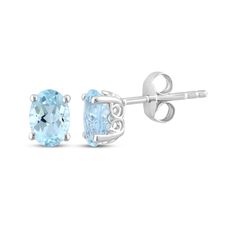 Add icy blue hues to your look with these solitaire stud earrings. Crafted in 10K white gold, each earring shines with an oval-cut aquamarine. These post earrings secure with friction backs. Pearl Diamond Jewelry, Diamond Band Engagement Ring, Cross Jewelry Necklace, Eternity Ring Gold, Fan Jewelry, Gold Book, Best Valentine's Day Gifts, Solitaire Studs, Aquamarine Stone