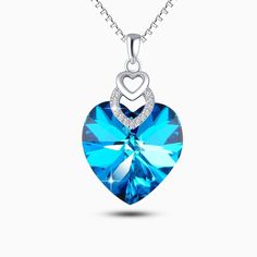 An explosion of beautiful colors, our Heart of the Ocean is crafted in 925 Sterling Silver that features a gorgeously crafted heart stone pendant. Exclusively available in silver. This bright sparkling necklace adds some “wow factor” to your wardrobe! Premium Materials - Made from authentic gemstones & nickel-free metal Cubic Zirconia Gemstone Heart Pendant Necklace, Valentine's Day Crystal Pendant Necklace, Sapphire Jewelry For Valentine's Day, Crystal Heart Pendant Jewelry For Her, Crystal Heart Pendant Jewelry Gift For Her, Silver Heart Crystal Necklace, Sterling Silver Gemstone Heart Necklace, Heart Shaped Crystal Gemstone Jewelry, Sapphire Heart Necklaces For Anniversary