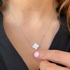 ✔️ Sterling silver 925 & mother of pearl gemstone ✔️ A Dainty Cross Necklace you will love!! ✝️ >>Handcrafted with love for you in GREECE!! >> MATERIAL This crucifix necklace is handmade with sterling Siver 925 Available with 22K Gold finish or rose gold finish >>SIZE Mother of pearl Cross: width >> 0.4 inches - 1.1 cm height >> 0.4 inches - 1.1 cm Chain: Chain length available options : 13-14-15 -16-17-18-19 inches (30-32-35-38-40 -42-45-48 -50 cm ) plus 1 inch Simple White Round Pendant Necklace, White Flower Pendant Charm Necklace With Delicate Chain, White Minimalist Necklace With Delicate Chain, Modern White Jewelry With Delicate Chain, Minimalist White Sterling Silver Necklace, White Sterling Silver Charm Necklace With Adjustable Chain, White Necklace With Delicate Chain For Her, Simple White Necklace For Gift, Dainty White Flower Pendant Necklace