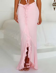 Feminine Maxi Skirt For The Beach, Feminine Maxi Length Ruffled Skirt, Pink Tiered Ruffle Maxi Skirt, Pink Ruffled Skirt Maxi Dress For Spring, Feminine Stretch Maxi Skirt For Summer, Chic Pink Stretch Maxi Skirt, Pink Flowy Full-length Skirt, Fitted Pink Maxi Dress With Ruffled Skirt, High Waist Pink Maxi Skirt For Spring