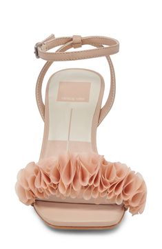 Voluminous ruffles add modern elegance to the vamp of a soirée-ready sandal framed by a squared-off toe and flared block heel. 3 1/4" heel (size 8.5) 3" strap height Adjustable ankle strap with buckle closure Leather and textile upper/synthetic lining and sole Imported Summer Sandals With Padded Heel For Wedding Guest, Chic Wedding Sandals For Summer, Chic Sandals For Wedding Guest In Summer, Chic Summer Sandals For Wedding Guest, Summer Wedding Guest Heels With Wrapped Heel, Glamorous Heels For Spring Wedding Guests, High Heel Sandals For Summer Wedding Guests, Summer Sandals With Heel Strap For Wedding Guests, Summer Open Heel Sandals For Wedding Guest