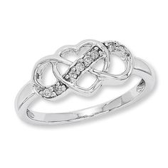 Give her a fashion ring that says "forever." Perfect for casual wear, this sleek sterling silver design features polished ribbons that loop and twist into a clever infinity knot at the center. Elegant and alluring, this ring is buffed to a bright polished shine. This ring is available in select sizes only. Sterling silver rings cannot be resized after purchase. Raw Diamond Jewelry, Silver Diamond Jewelry, Casual Rings, Infinity Knot, Sunflower Jewelry, Silver Ring Designs, Tiffany Jewelry, Infinity Ring, Gold Jewelry Necklace