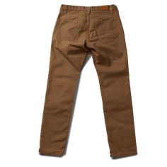 STORY Our flagship pant, the Foundation has been with us since the very beginning. This timeless classic was designed and built to be as ready an option as your favorite pair of jeans; they will no doubt contend for the top position as your go-to pant for daily wear in all conditions. Attention to details and fit, the Foundation is built with function, durability and versatility all in mind. This pant is constructed in our State-side Canvas, a substantial fabric is micro sanded and has a fusion Classic Brown Straight Bottoms, Brown Straight Bottoms With Five Pockets, Brown Straight Pants With Five Pockets, Brown Straight Hem Pants With Five Pockets, Brown Pants With Five Pockets Straight Hem, Brown Pants With Five Pockets And Straight Hem, Classic Brown Bottoms With Patch Pockets, Chino Cotton Twill Pants With Belt Loops, Straight Leg, Classic Selvedge Bottoms With Straight Hem