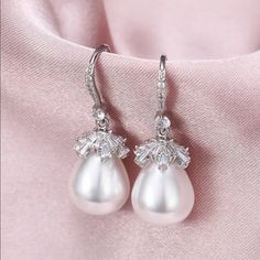 Brand New Women's Hanging Pearl & Diamond Earrings 18k White Gold Plated Sterling Silver Genuine 2ct Lab Created Diamonds Real Natural Freshwater Pearls Measurements 1.5" H X .5" W Retail Price $295 Buy With Confidence From A Trusted Seller W/ A 99%+ Rating! A0250 (Id-189-) Pear-shaped Pearl Drop Bridal Earrings In White Gold, Pearl White Jewelry For Formal Occasions, White Gold Bridal Earrings Teardrop Elegant Design, Exquisite White Gold Teardrop Bridal Earrings, Exquisite Teardrop Bridal Earrings For Formal Occasions, Elegant Teardrop White Gold Bridal Earrings, Elegant White Gold Teardrop Bridal Earrings, Elegant Pear-shaped Jewelry For Evening, Formal White Gold Pear Shaped Earrings