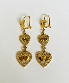 "These vintage dangle heart earrings are ready to wear or give away! The earrings are beautiful. I found the earrings at an estate sale of a jewelry lover in Michigan.  Beautiful vintage condition. They were still in the original packaging.  The dangle length is approximately 1 3/4\"  Any questions please message me.  The earrings will arrive in a gift box." Vintage Heart Charm Earrings For Valentine's Day, Mother's Day Heart Drop Earrings, Vintage Dangle Earrings For Anniversary, Mother's Day Heart Pendant Earrings For Pierced Ears, Mother's Day Heart Pendant Earrings, Vintage Heart Charm Drop Earrings, Vintage Double Heart Earrings For Gift, Vintage Double Heart Earrings As Gift, Vintage Drop Earrings For Valentine's Day