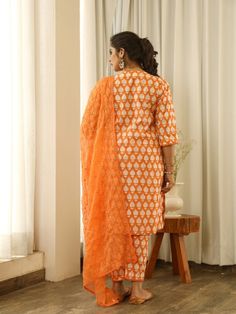 Beautiful handcrafted straight kurta pants set in pure cotton with lovely matching cotton doriya dupatta that is rightly finished with mirror embroidery. Color: Orange Fabric: Cotton and Kota Doria Note: Length and sizes can be customised Length - Kurta 40 inches Pants 38 inches Available in other colors If you happen to see some deformity in hand-work or fabric, that’s mere the technique of the same and not a defect. The garment is quite premium. The product will be delivered within 20-25 days Diwali Cotton Silk Palazzo Set With Chikankari Embroidery, Orange Chikankari Embroidery Palazzo Set For Diwali, Diwali Orange Chikankari Embroidery Palazzo Set, Orange Embroidered Palazzo Set With Straight Kurta, Straight Kurta In Cotton Silk With Mirror Work, Straight Cotton Silk Kurta With Mirror Work, Orange Chikankari Embroidery Palazzo Set For Eid, Designer Orange Sets With Chikankari Embroidery, Unstitched Straight Kurta Palazzo Set With Gota Work