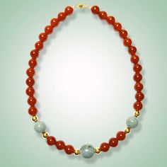 Crafted with vibrant carnelian and mint green jade, this necklace is a stunning addition to any jewelry collection. Both stones are known for their healing properties and are believed to bring good luck and prosperity to the wearer. Mint green jade (16 and 18mm) Carnelian Goldfilled Length: 20 inches Traditional Jade Gemstone Necklaces, Elegant Hand-strung Jade Necklace, Hand-strung Round Jade Necklace, Carved Jade Round Bead Necklace, Hand-strung Jade Necklaces With Round Beads, Bring Good Luck, Green Jade, Bridal Beauty, Jade Green