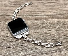 Know someone who owns Apple Watch? This is the PERFECT gift! Be Different and Unique Designed And Handmade by Simeon D Jewelry The Bracelet fits Apple Watch All Series This Product Is Not Water Resistant/Proof And Not Suitable for Workouts Not For Other Models. Apple Watch Is NOT Included Follow my Studio for Updates & New Designs Classic Metal Watch Bands For Gifts, Formal Silver Watch Band With Solid Link Construction, Classic Silver Stainless Steel Apple Watch Band, Silver Bracelet Strap Apple Watch Band For Formal, Silver Bracelet Strap Apple Watch Band For Formal Occasions, Formal Silver Bracelet Strap Apple Watch Band, Classic Silver Apple Watch Band With Bracelet Strap, Classic Silver Apple Watch Band For Formal Occasions, Luxury Silver Apple Watch Band Gift