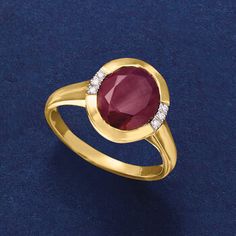 Ross-Simons - 5.00 Carat Ruby Ring Oval Cut with Diamond Accents in 14kt Yellow Gold. Size 5. Add a richness to your look with this fiery 5.00 carat oval ruby. Trios of diamond accents spark each side of the glossy 14kt yellow gold setting. 1/2" wide. Diamond-accented and ruby ring. Ruby birthstones are the perfect gift for July birthdays. Oval Cabochon Ruby And Diamond Ring, Luxury Oval Diamond Ring With Lab-created Ruby, Formal Ruby Ring With Diamond And Oval Cabochon Shape, Oval Ruby Diamond Ring With Prong Setting, Formal Oval Cabochon Ruby Ring With Diamond, Oval Ruby Ring With Diamond, Classic Red Oval Diamond Ring, Classic Oval Lab-created Ruby Diamond Ring, Oval Lab-created Ruby Diamond Ring In Fine Jewelry Style