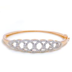 This exquisite 18k rose gold bangle bracelet, weighing 10.2 grams, features a stunning tapered design adorned with dazzling diamonds. The rose gold finish enhances its luxurious appeal, making it perfect for any special occasion. The bangle is set with 0.90 carats of F-G color, VS quality diamonds in round brilliant cut shapes. With an oval opening of 2.25 inches, this piece offers both elegance and comfort. The bangle is openable, designed with a push snap lock and clasp for added convenience. Hand-set Rose Gold Diamond Bracelet, Dazzling Rose Gold Diamond Cut Bracelets, Dazzling Rose Gold Bracelets With Diamond Cut, Hand Set Rose Gold Diamond Bracelet, Dazzling Rose Gold Diamond Cut Bracelet, Rose Gold Diamond Bracelet With Accents For Wedding, Elegant Rose Gold Diamond Chain Bracelet, Elegant Hand-set Rose Gold Bracelet, Elegant Diamond Bangle Bracelet With Pave Setting