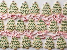 christmas cookies decorated with candy canes and icing