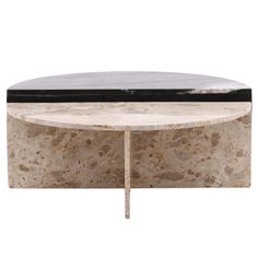 a marble coffee table with a black top and metal base on an isolated white background