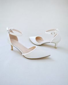 Shop our women shoes collection in glitter, satin and lace. Comfortable wear for bridal party, formal wear, night out and weddings. FREE SHIPPING IN U.S FOR ORDERS $100 AND MORE! Elegant Pearl Embellished Ankle Strap Heels, Elegant Cream Kitten Heels For Formal Occasions, Chic Low Heel Pearls Embellished Heels, Chic Pearl Embellished Ankle Strap Wedding Shoes, Elegant Kitten Heels With Heel Strap, Feminine Ankle Strap Kitten Heels For Formal Events, Feminine Ankle Strap Kitten Heels For Formal Occasions, Feminine Formal Ankle Strap Kitten Heels, Elegant White Kitten Heels