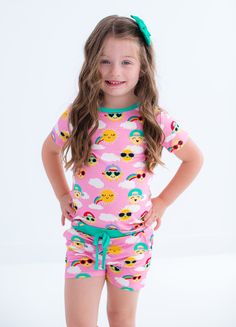 This set effortlessly blends comfort and style with its luxurious blend of bamboo viscose and spandex fabric. Its soft fit is complemented by charming prints, ensuring it will become a beloved favorite. The breathable fabric ensures your little one will stay comfortable all day long! MATERIAL/FEATURES: -95% viscose from bamboo, 5% spandex -made from bamboo viscose not treated with any harsh chemicals -tagless for added comfort -buttery soft and great for sensitive skin -ties are not functional * Spring Printed Sleepover Sets, Printed Sets For Spring Sleepover, Spring Printed Sets For Sleepovers, Printed Sets For Spring Sleepovers, Playful Printed Cotton Sleepwear, Playful Fitted Loungewear Sets, Summer Playwear Tops With Elastic Waistband, Playful Pink Matching Set Sleepwear, Playful Sleepwear For Loungewear