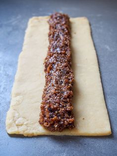 a piece of food sitting on top of a table